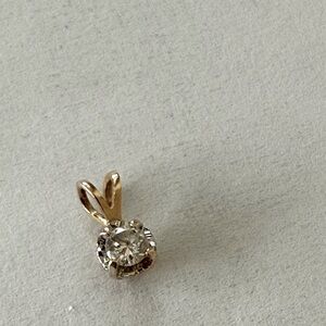 Gold and diamond pendant